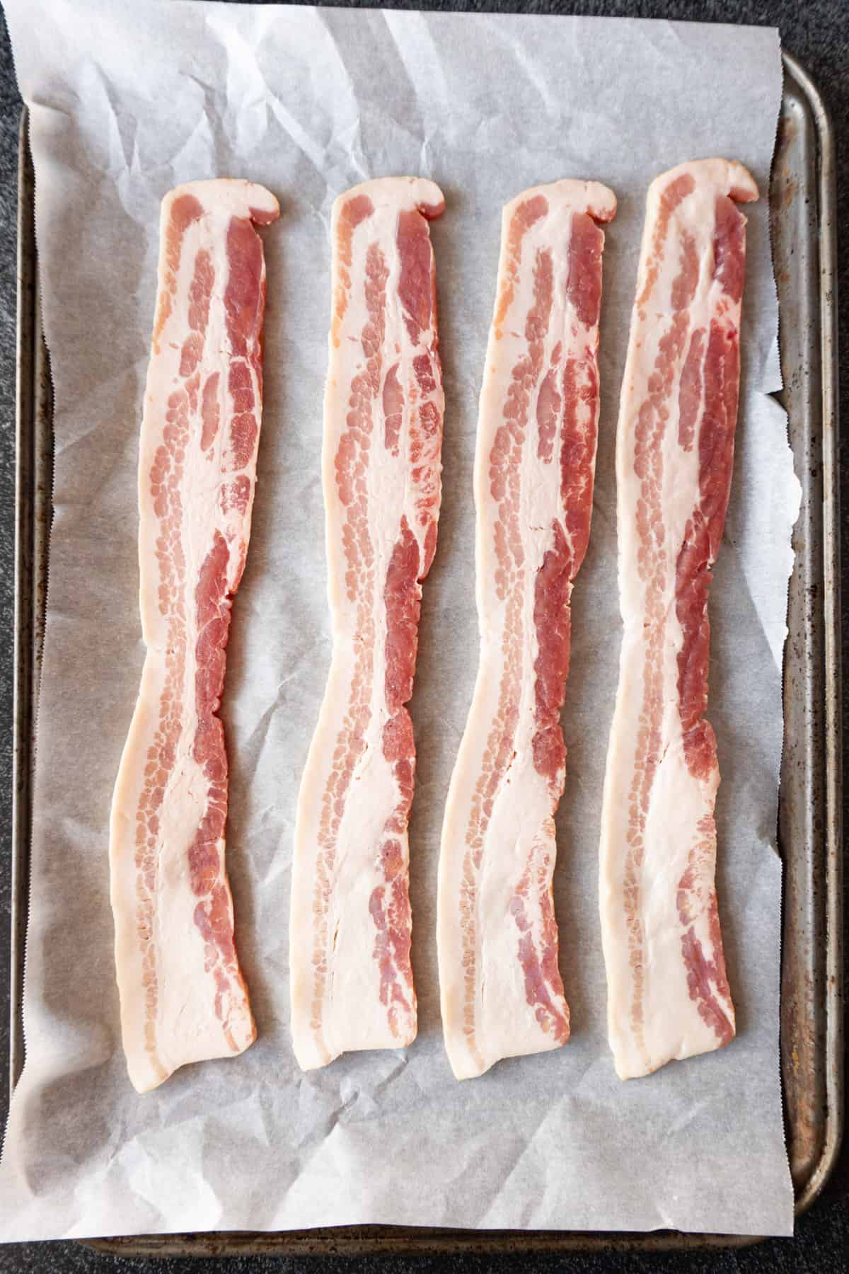 Can You Eat Bacon Raw? Bacon Safety Tips